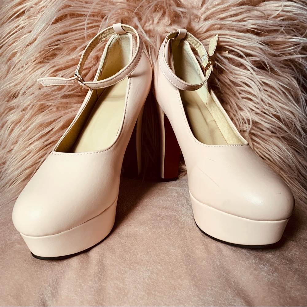 Cute 5 inch pink heels. Red bottom, not used.